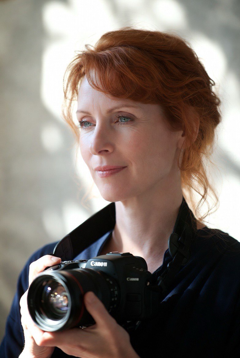 Photographer with camera